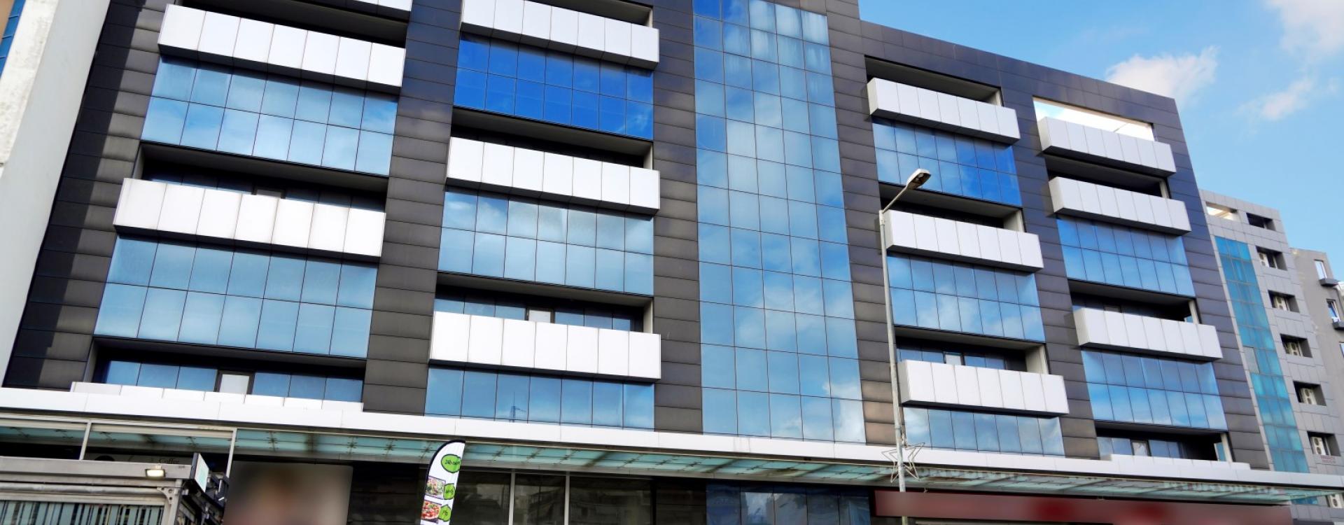 Commercial Building with Offices, Retail Space & Parking
