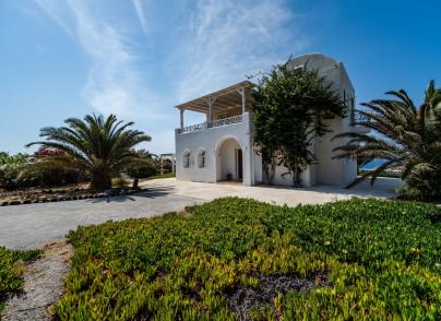 Panoramic views properties of the azure Aegean Sea and the world-famous Santorini sunset