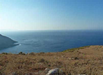 Land with large sea frontage and unfinished villa