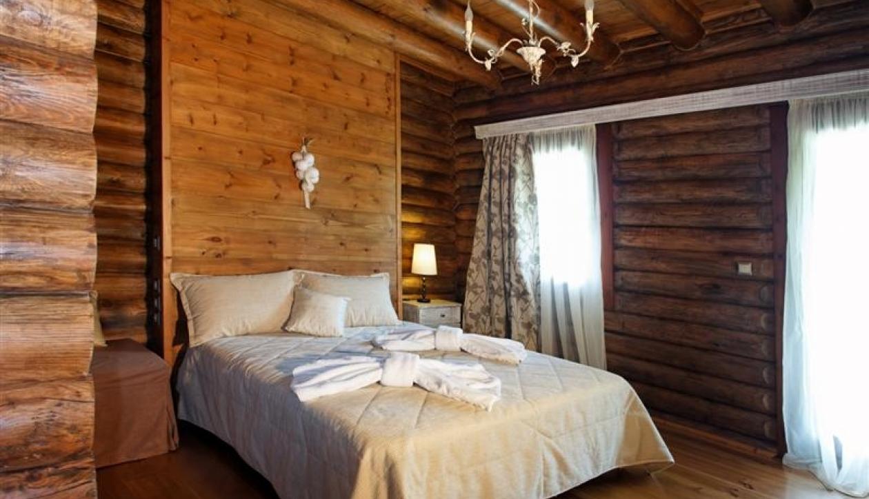 A stunning log chalet type villa in peaceful and verdant location