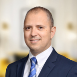 Tassos Angelopoulos, MRICS, MScEcon profile