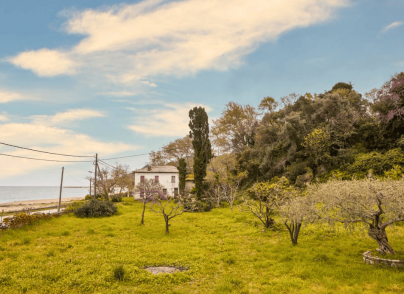 Historic Seafront Stone Mansion with Land