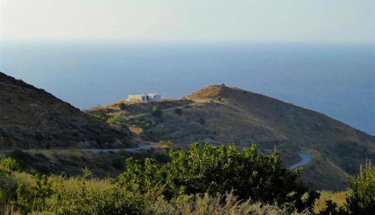 Land with large sea frontage and unfinished villa